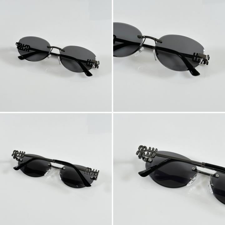 Miiu Miiu Latest Gun Black Round Cut Sunglasses
