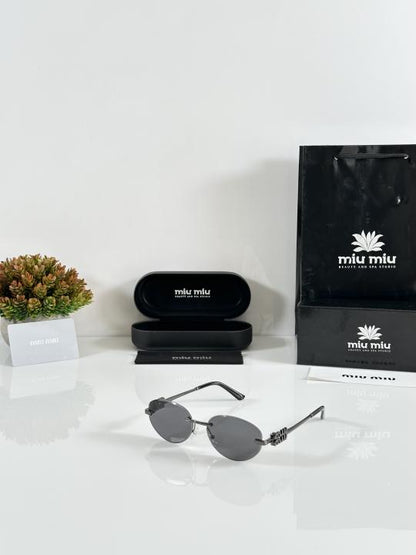 Miiu Miiu Latest Gun Black Round Cut Sunglasses