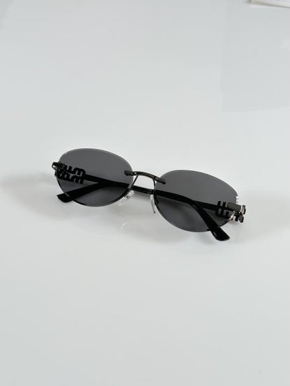 Miiu Miiu Latest Gun Black Round Cut Sunglasses